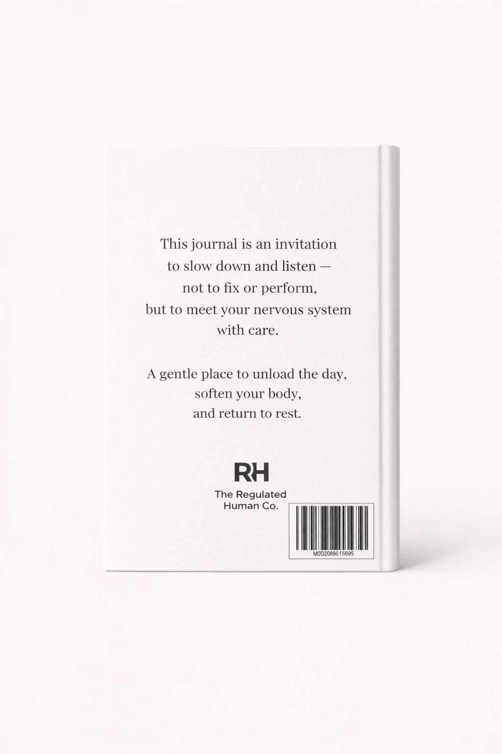White journal with black text and a barcode on a white background