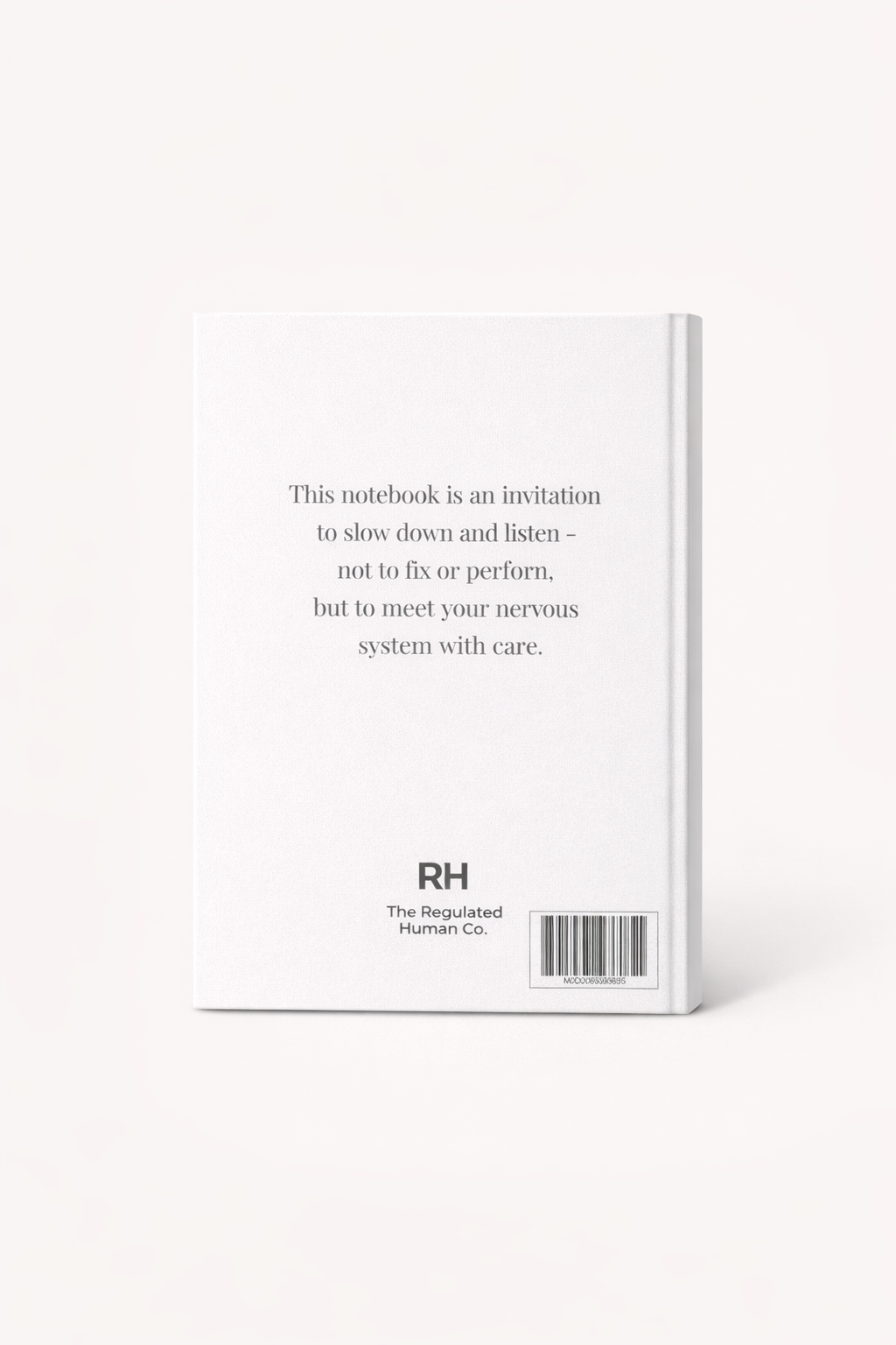 White notebook with text and a barcode on a white background